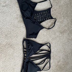 2 black bikini tops